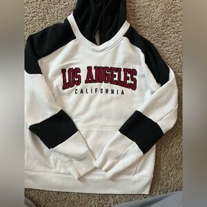 A Hollister hoodie size small fits perfectly isn’t too big is not too small.